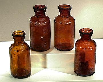 Four Vintage Brown Lysol Bottles