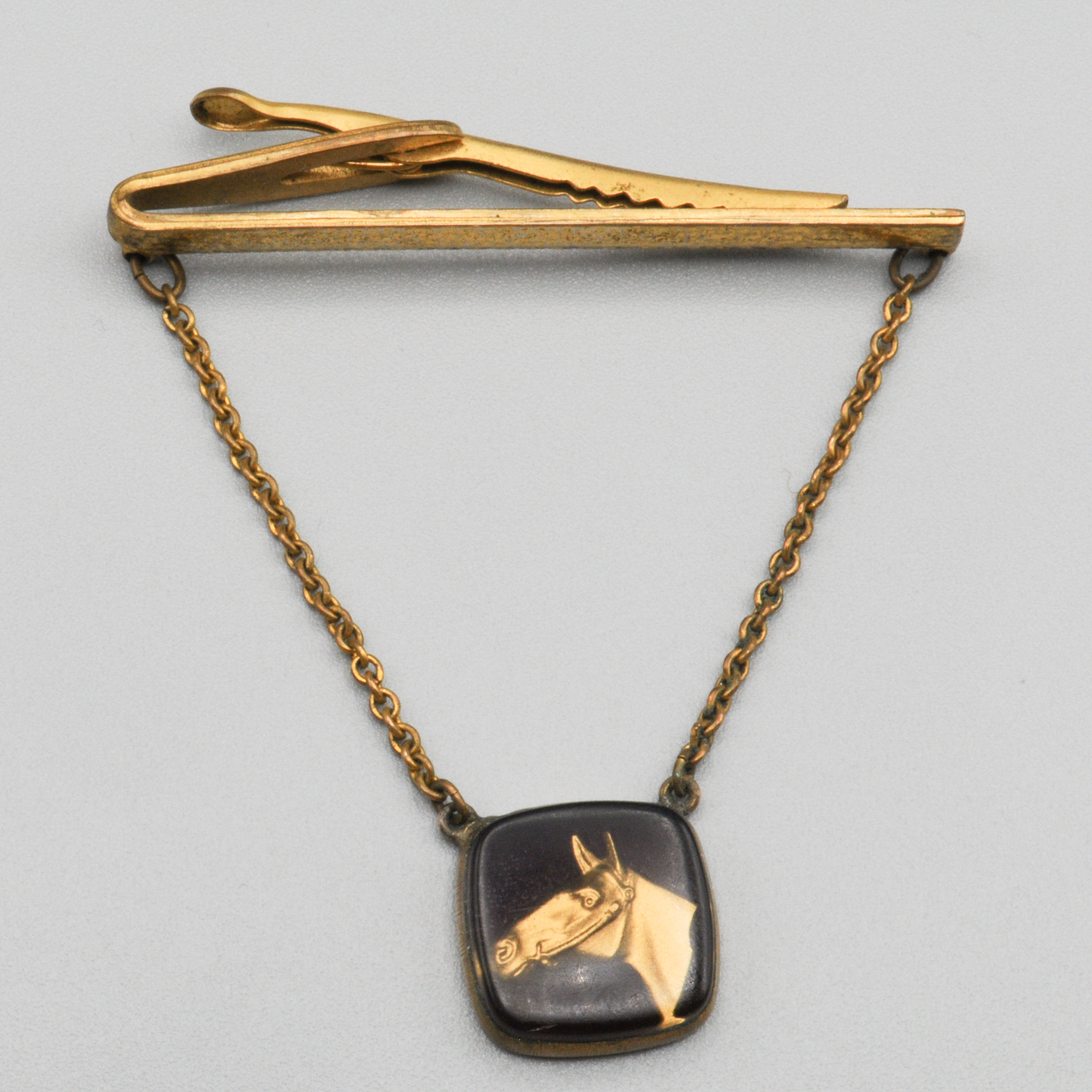 Reverse+Carved+Lucite+Tie+Clasp+w+Horse+Head picture 1