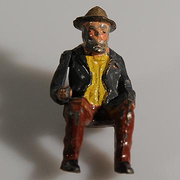 Britains+Hollowcast+Lead+Aged+Villager+Man+Seated+555 picture 1