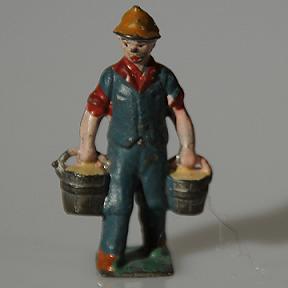 Vintage lead farmer dairyman with pails